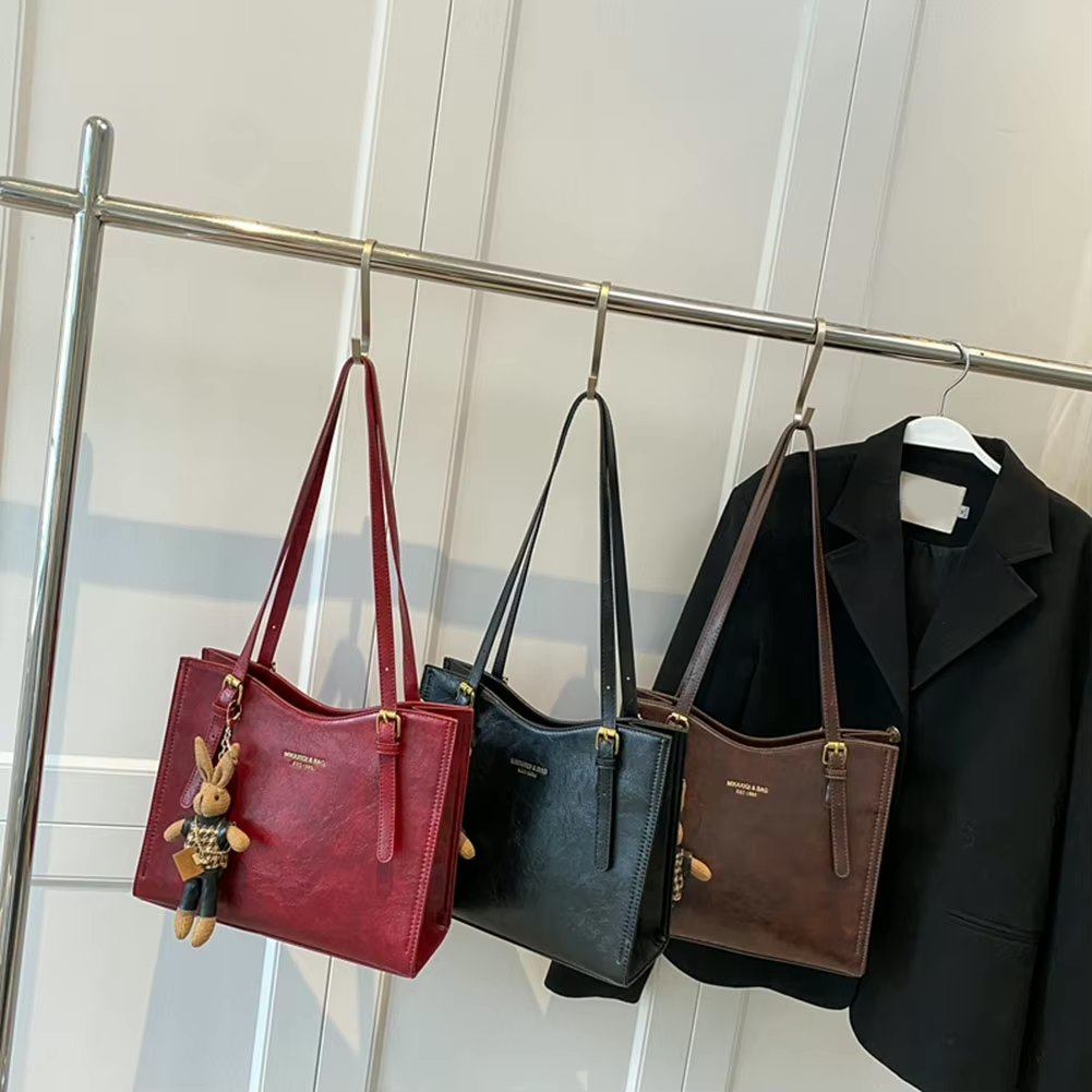 Borsa Ecopelle con Ciondolo Donna